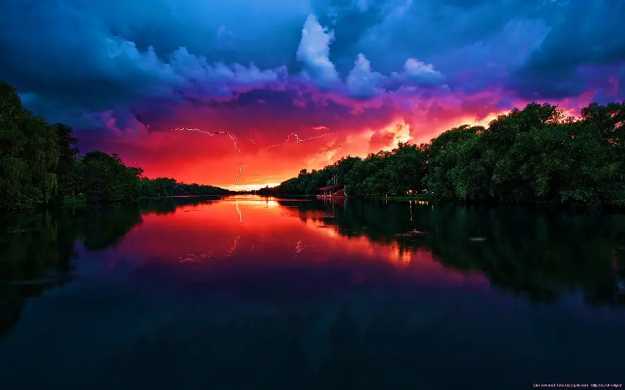 Fantasy photo of a colorful collage of the Amazon River in rainy weather and scary lightning