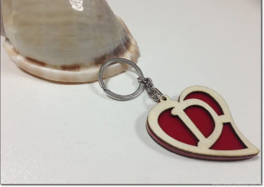Download the image of a beautiful necklace plaque of the English letter D with a red heart design 