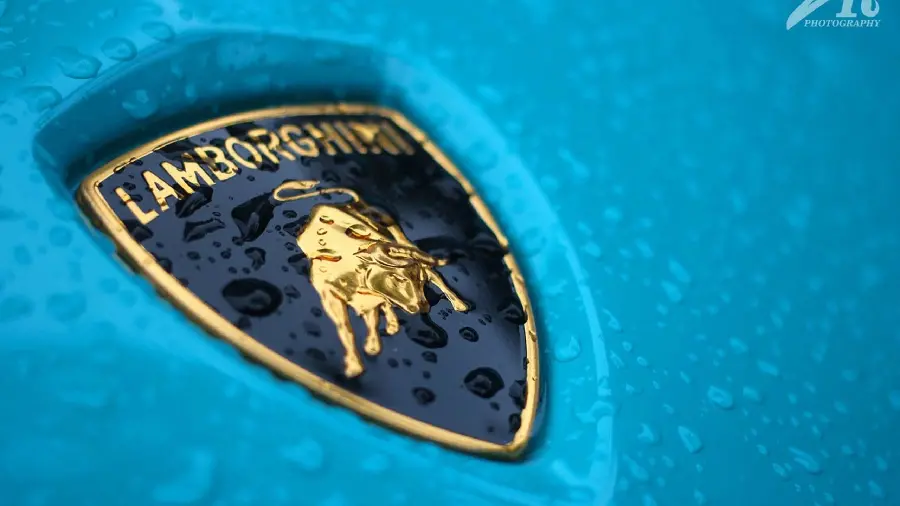 Download background image with Lamborghini logo design and logo with blue background