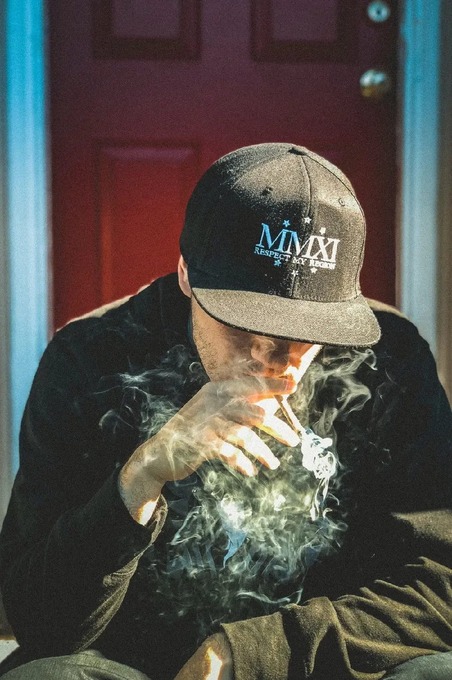 Cool wallpaper of a boy smoking for mobile in 4k quality