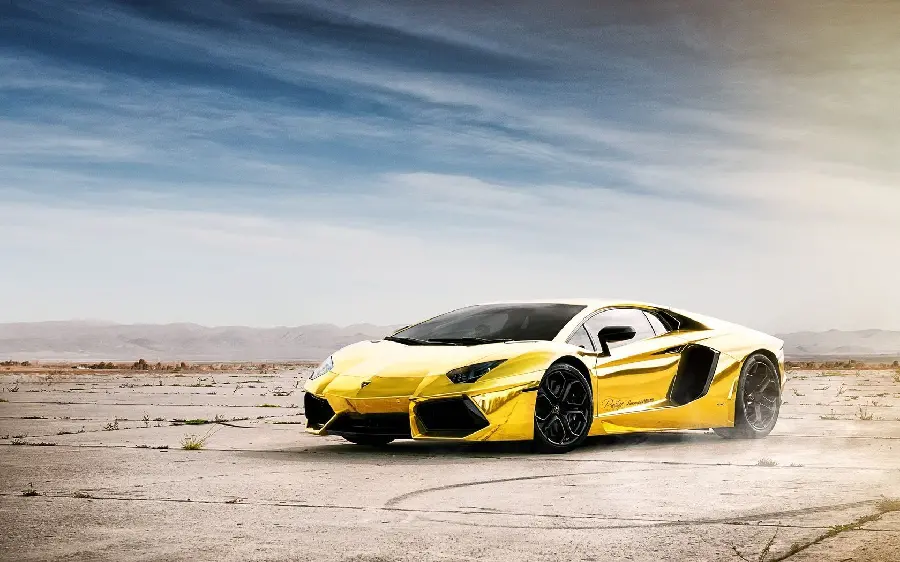Unique Background of a Golden Lamborghini Car in the Sandy Desert