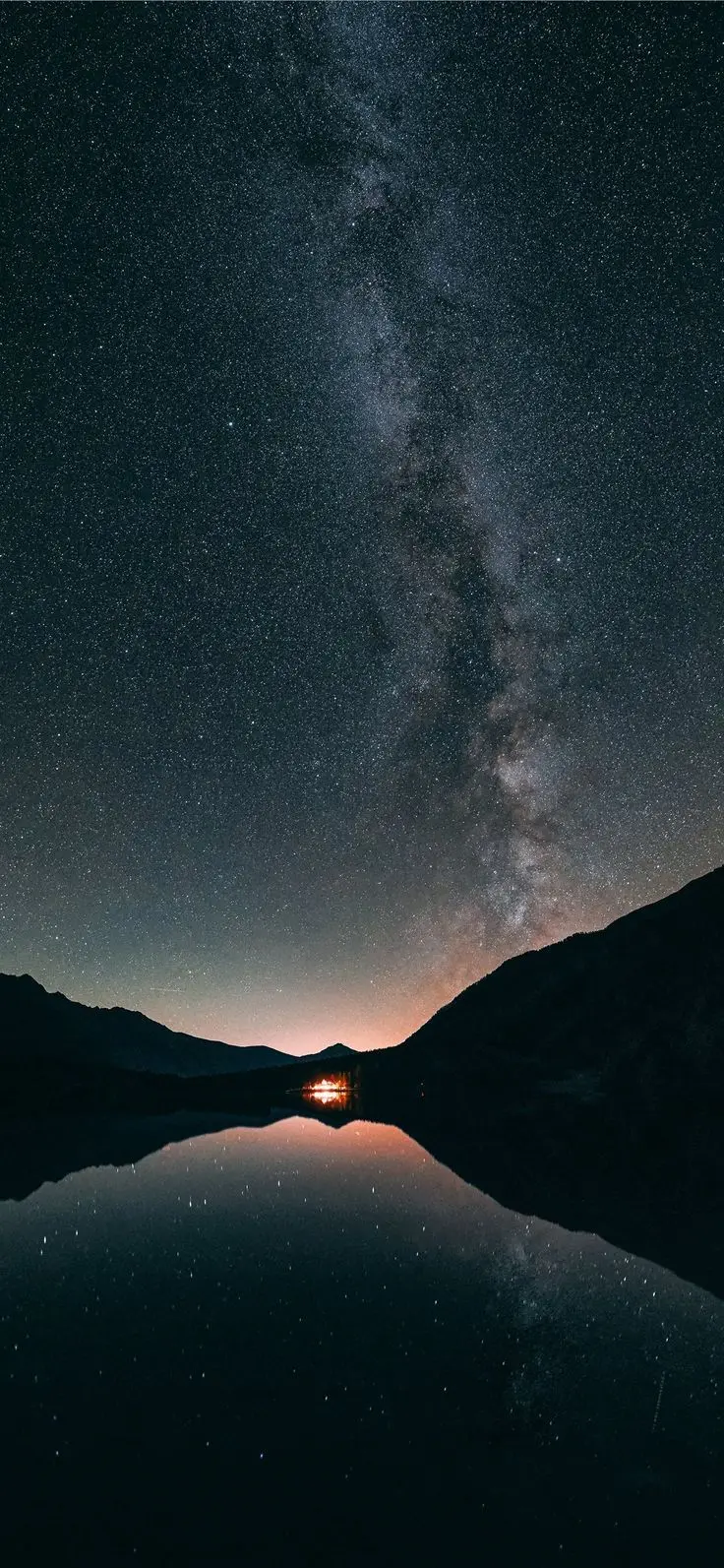 Download stock photo for Android phone Apple from the starry sky and its reflection in the water