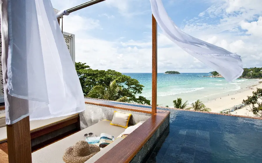 Famous stock photo of a corner of a very beautiful beach house and Sunbed by the sea