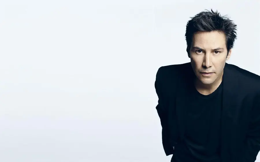 Laptop background with a spectacular design of a famous male model in a simple black dress