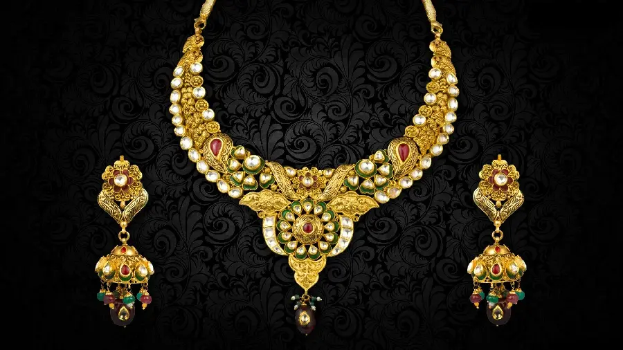 Dream photo of half a set of gold necklaces and earrings in HD quality 