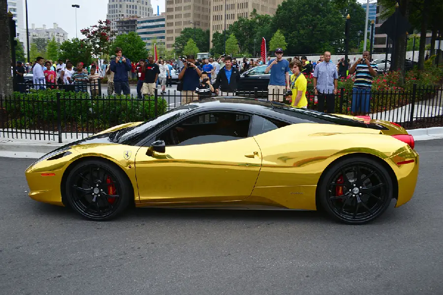 Free download of a golden Ferrari car image for Instagram in 8k quality