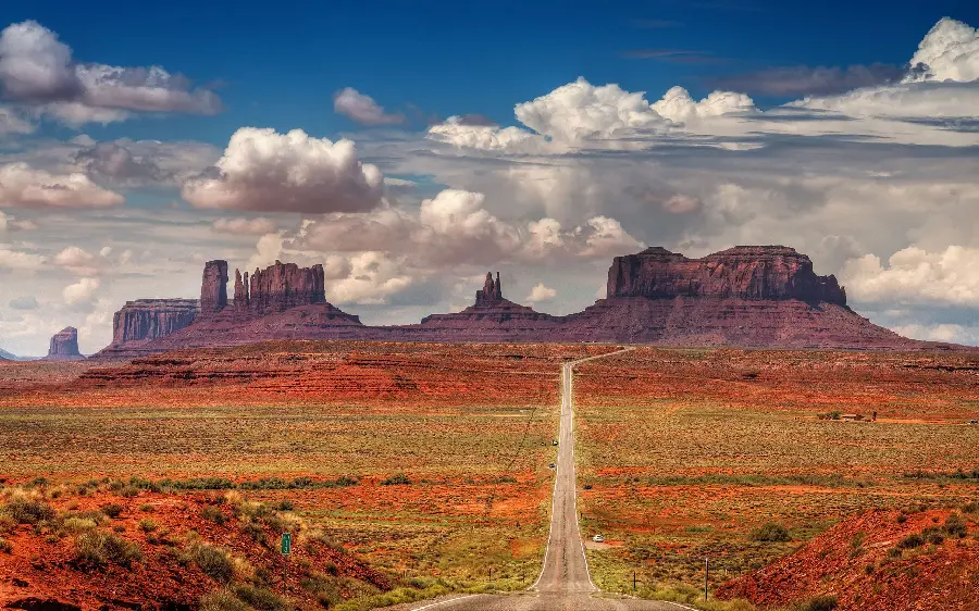 Interesting Background Of Monument Valley Highway In The Arizona Desert