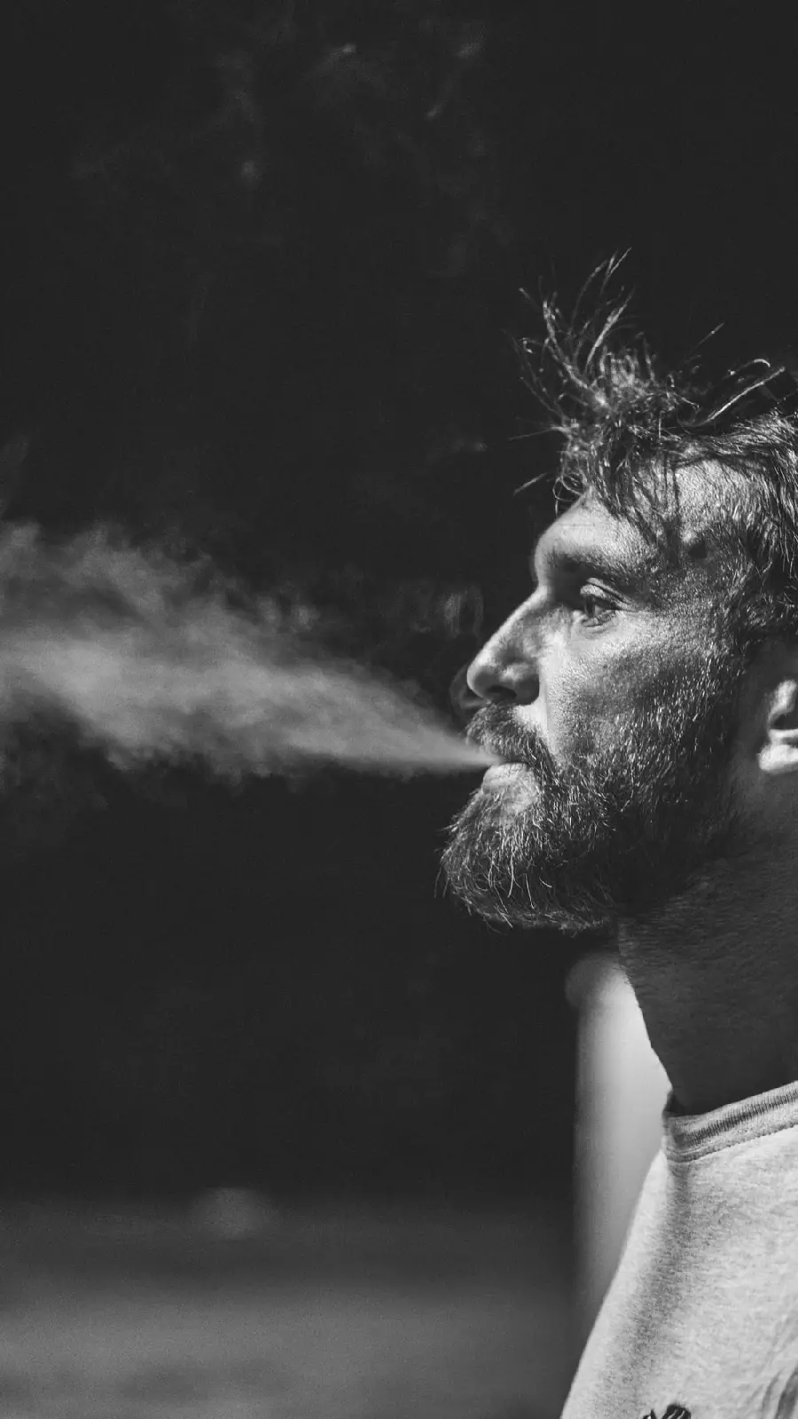 Strange and special wallpaper of a sad and disturbed smoking boy