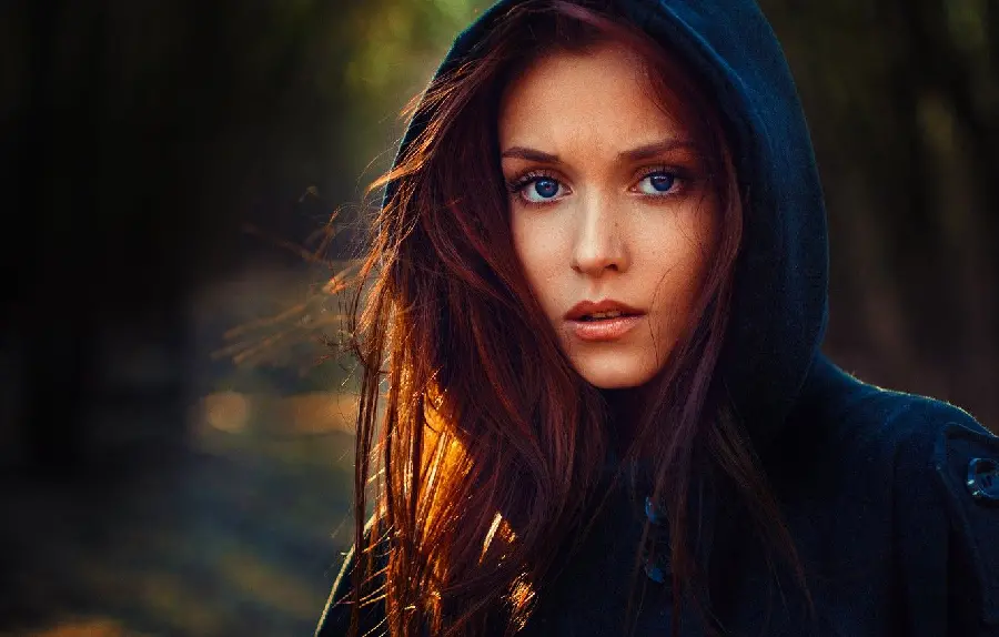 Download the unique background image of a beautiful Russian girl with gray eyes and hazel hair and a hooded coat for a laptop