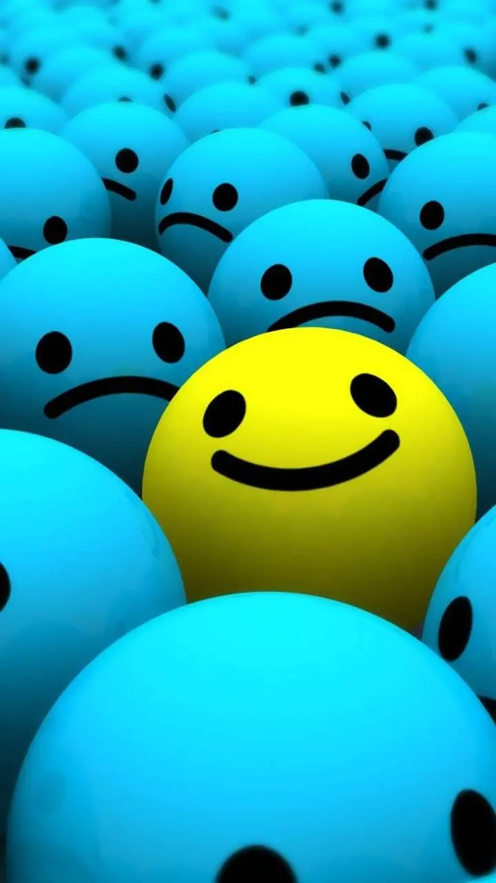 Happy yellow emoji among unhappy emojis