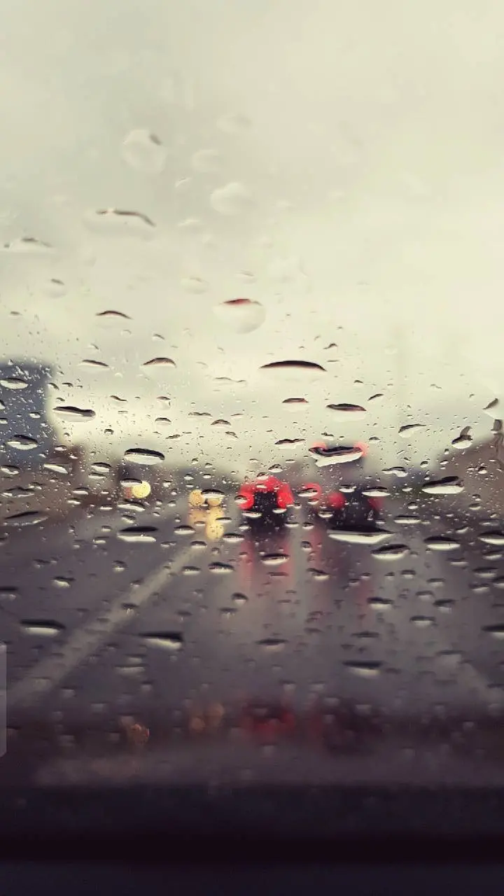 The most beautiful wallpaper of a car with raindrops in HD quality