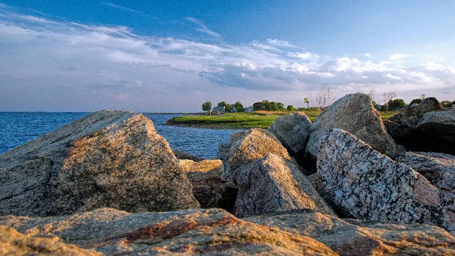 Download Full HD stock photo of rocks around the blue sea