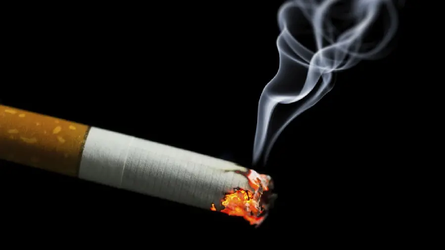 A special natural background photo of a laptop with bright cigarette smoke in HD quality