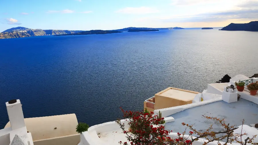 Profile photo of beautiful rooftops overlooking the sea in Santorini