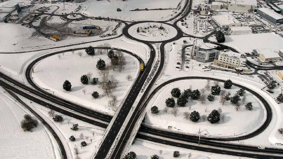 Exciting background of a city highway in winter nature and a photo of houses and places