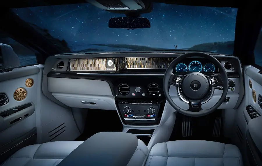 Beautiful background image of gray interior of Rolls Royce with steering wheel on the right
