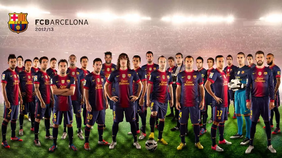 A group picture of Barcelona players holding hands