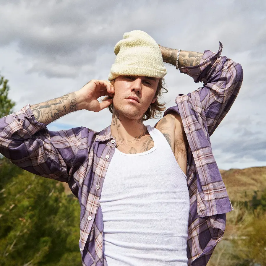 A lovely stock photo of Justin Bieber with a beautiful pose in nature