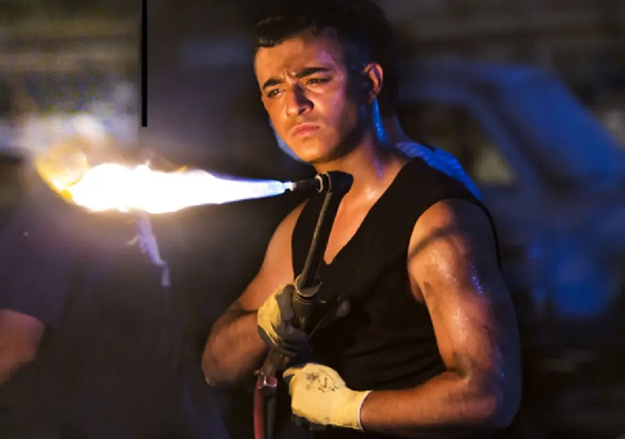 Good quality wallpaper of Javid in the series Yaghi with a gas can in his hand