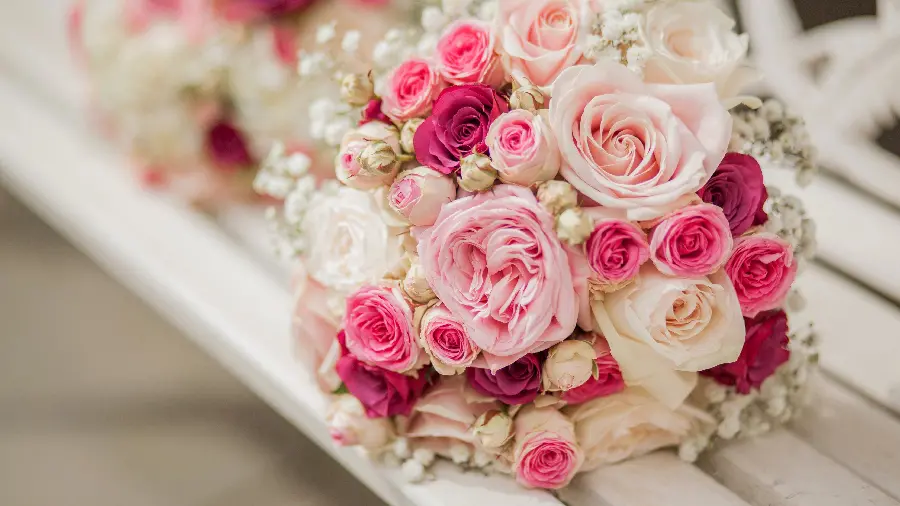 Download a beautiful stock image of a bridal bouquet in pink, burgundy and white