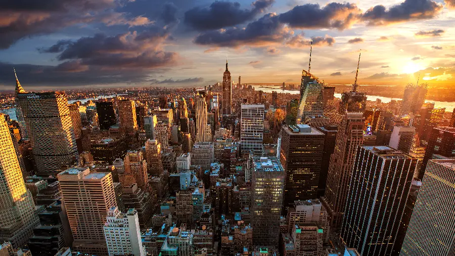 Download a modern background photo of the sunrise in the hustle and bustle of the city familiar