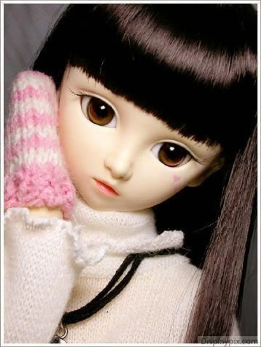 Beautiful background photo of a doll with bangs and a kind look 