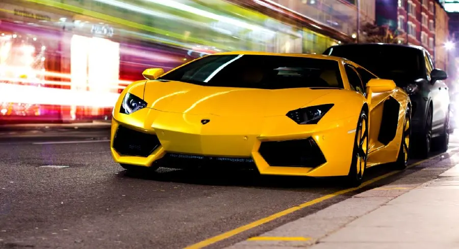 Luxury background of a yellow Lamborghini car with interesting texture for computer