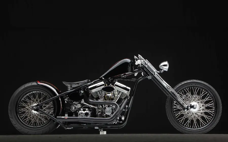 Stylish background of a black motorcycle on a black background