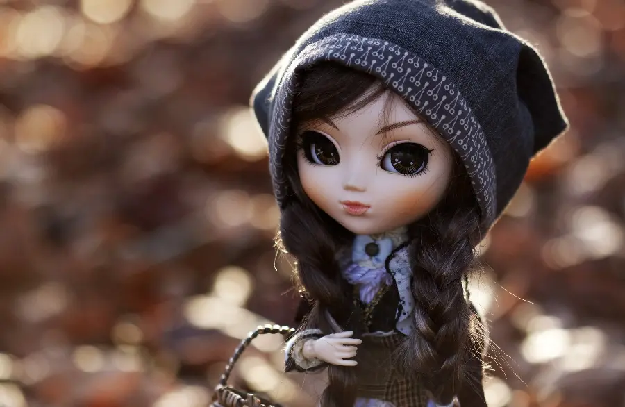 Smart black eyed girl and eyebrow wallpaper with doll theme 