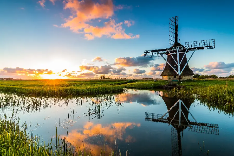 Grand stock photo of a cute windmill next to a spring with bright sunlight for those who like special things