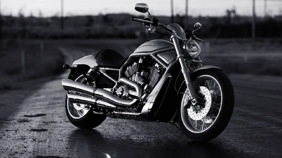 Download a shiny vector of a black motorcycle Color on an unknown road with excellent quality