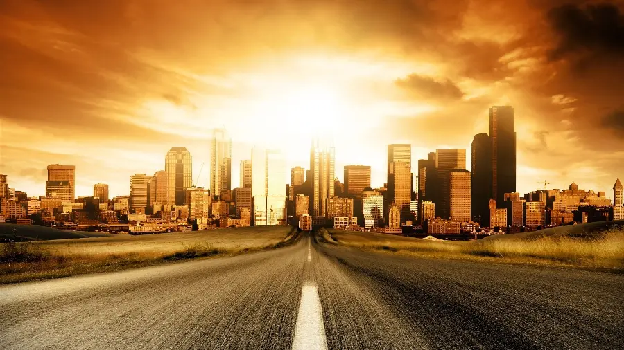 Fantasy and artificial image with a lot of light of a city road and different buildings in front of it