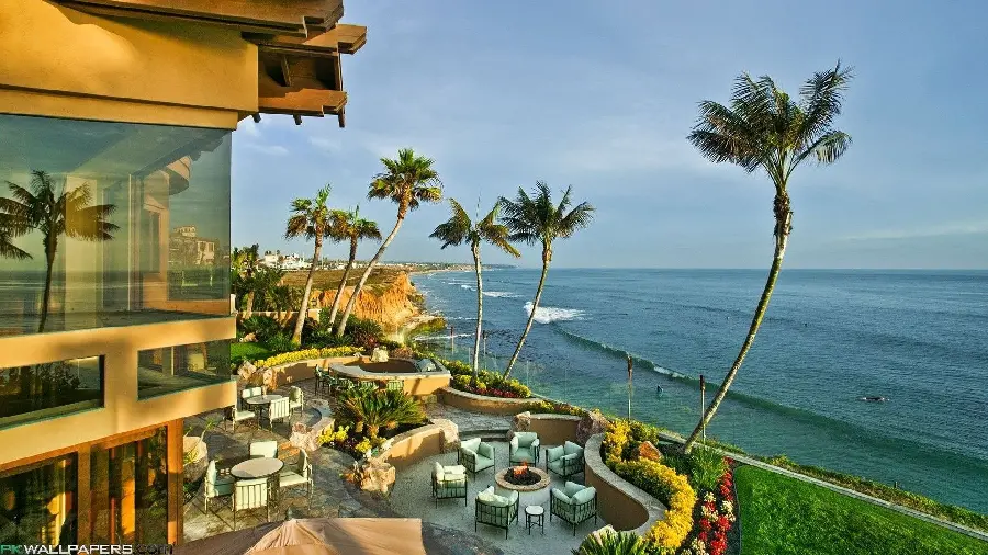 Amazing photo of a part of a sunny beach house villa facing the wavy sea in HD quality