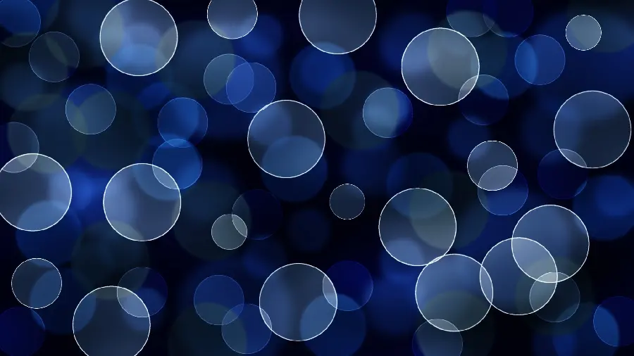 Abstract white and blue circle wallpaper image on a black background