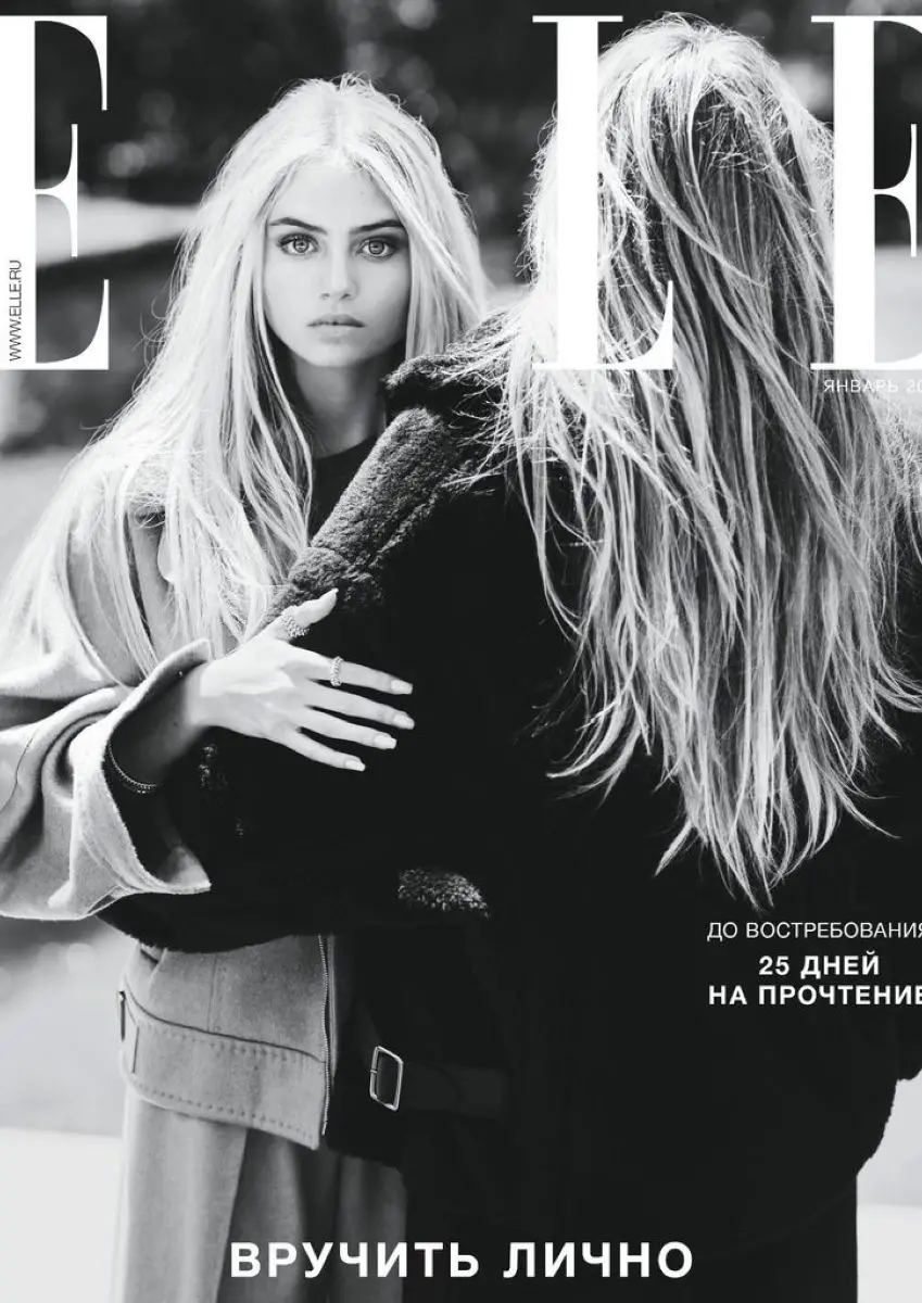 Download a spectacular photo of Leni Klum with a black and white theme and a serious and attractive face for your phone background 