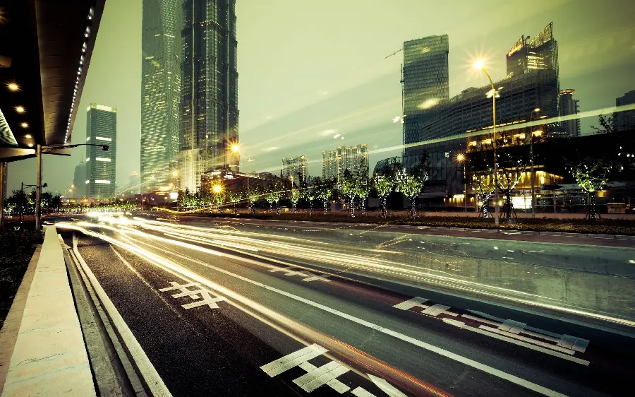 A picture of a magnificent, powerful, and luminous landscape from a city road alongside its unique architecture