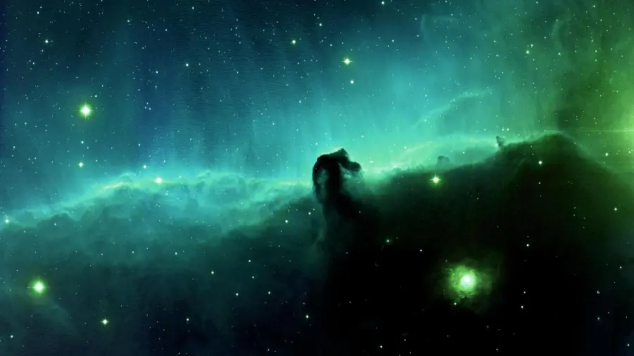 Download a spectacular stock photo of the Horsehead Nebula with green lights around it