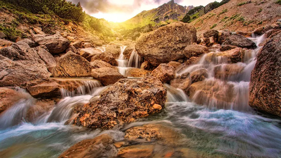 Impressive View of Beautiful Waterfalls in the Heart of Colorful Rocks