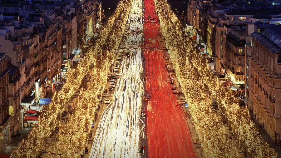 High-quality background of a long street in urban nature and a photo of colorful and decorative lamps