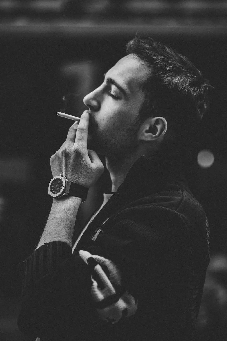 Free download of a classy smoking boy photo for high quality phone background