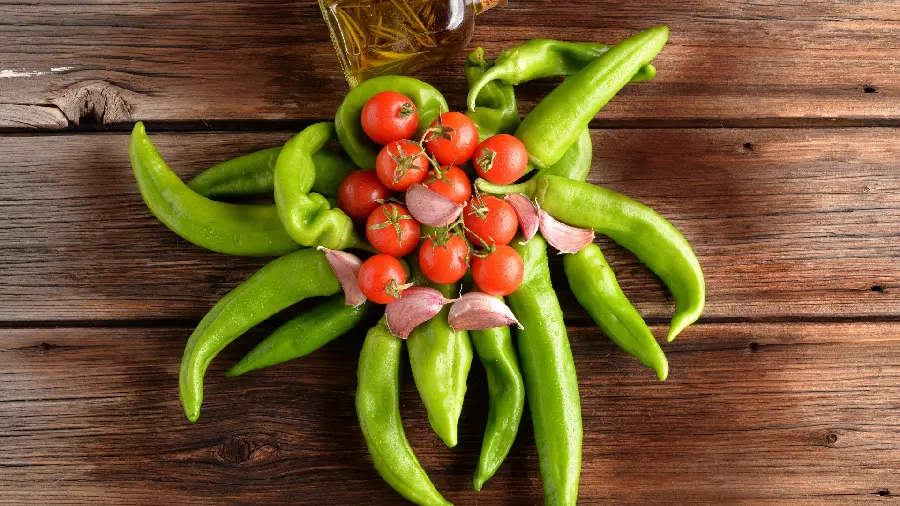 Photo of pepper Green and red tomatoes