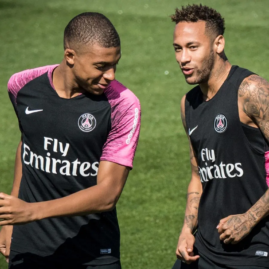 Stock photo in HD quality of Neymar with a sports top and Mbappe with a pink sleeve sportswear