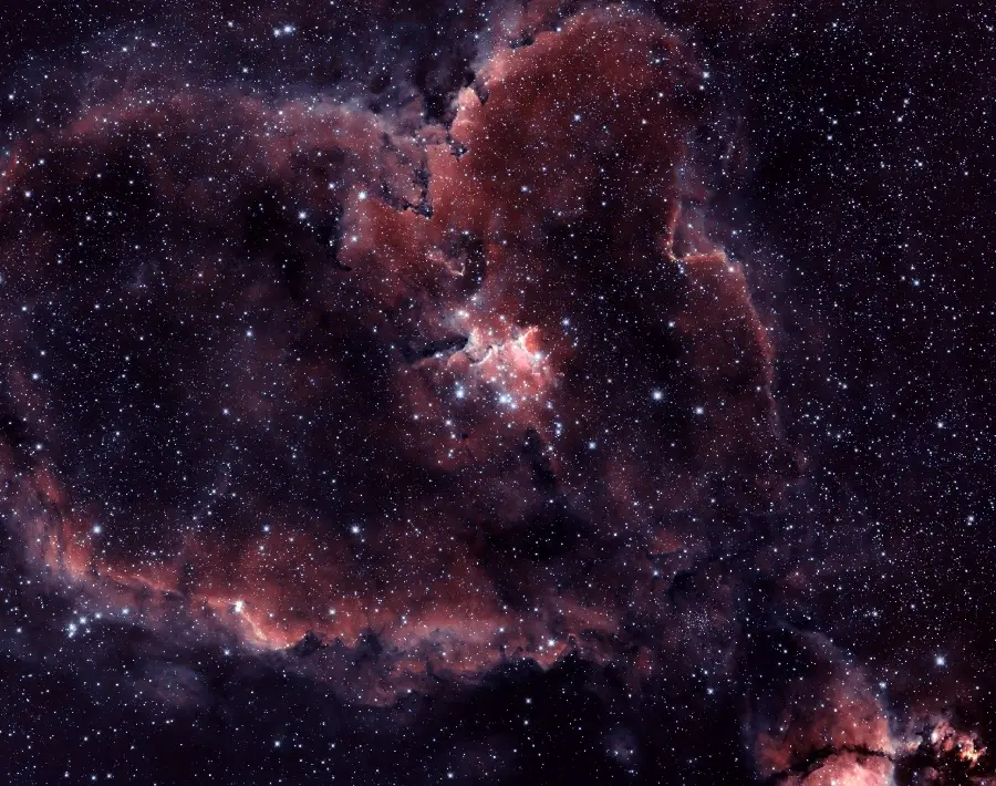 Download a background of the Heart Nebula with a brown color around it in full quality