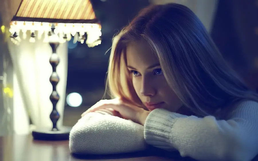 Download special Telegram wallpaper of a beautiful girl mourning at night next to a night lamp in high quality