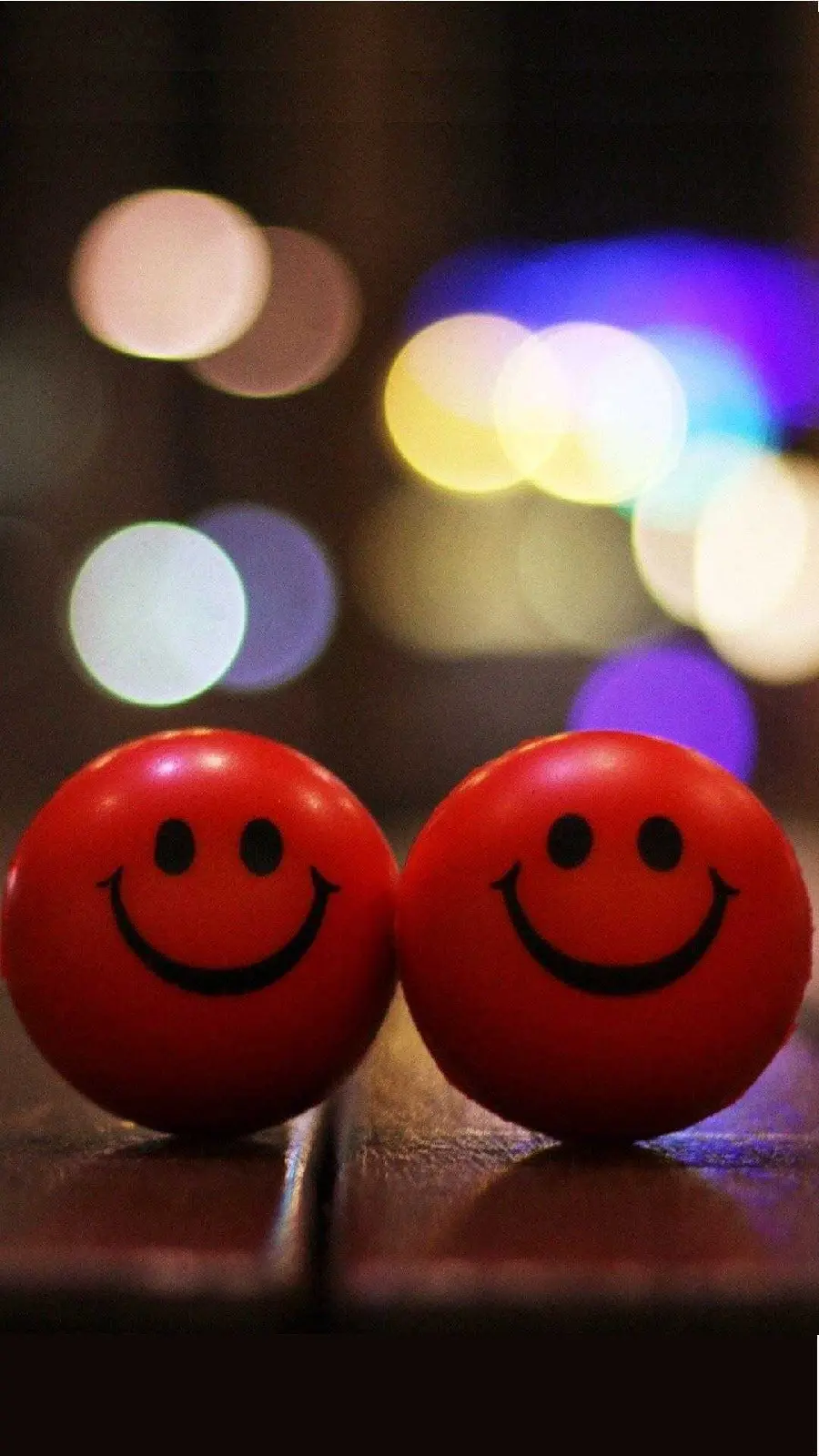 Energetic background image of 2 red smiling emojis in HD quality suitable for tablets