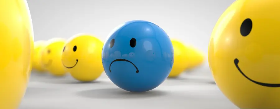 Blue unhappy emoji image among happy emojis