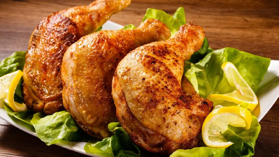 Full HD quality stock photo of three pieces of chicken thigh kebab First class with lettuce and lemon slice