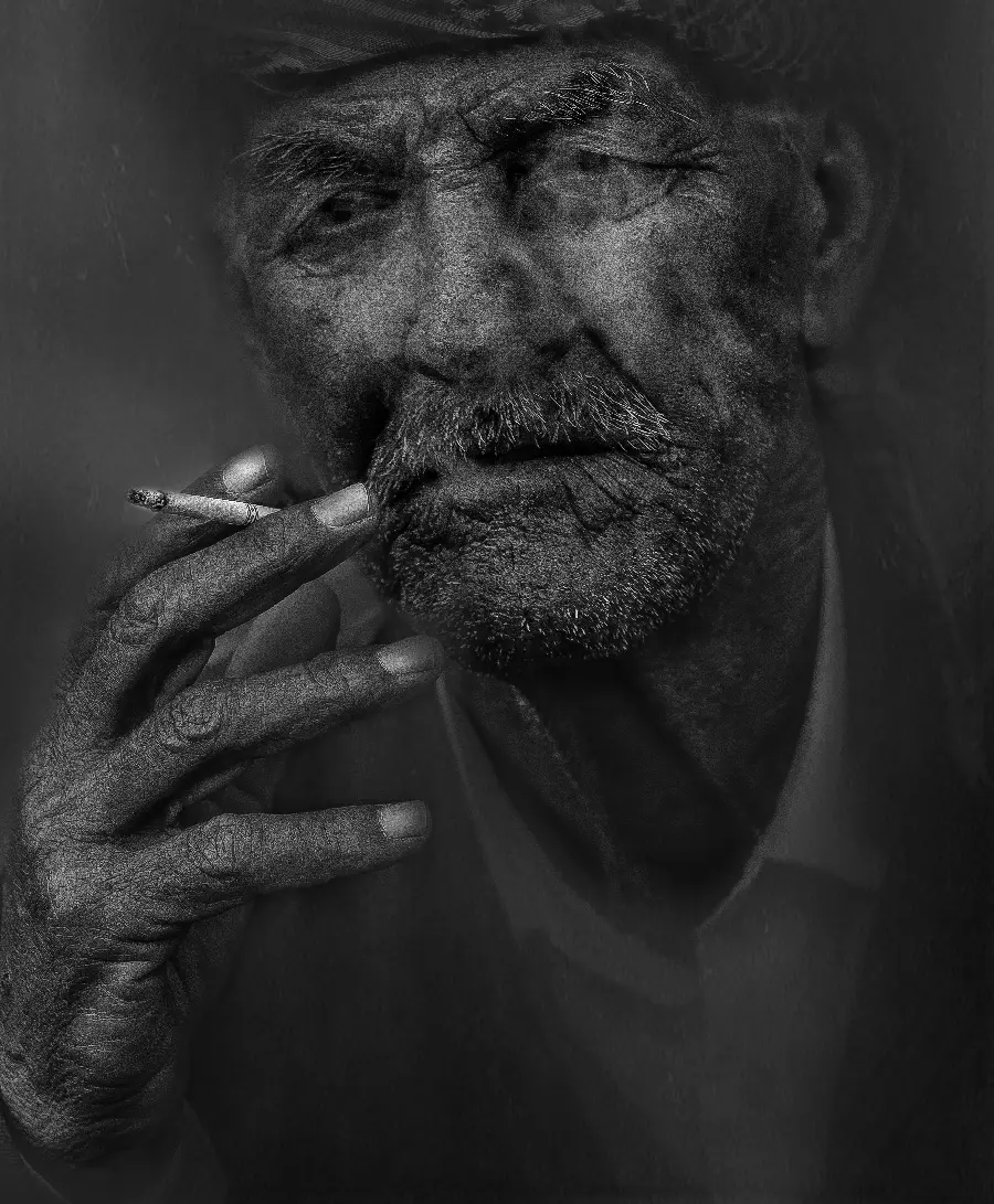 The Saddest Neutral Image of an Old Man Smoking for an Instagram Post 