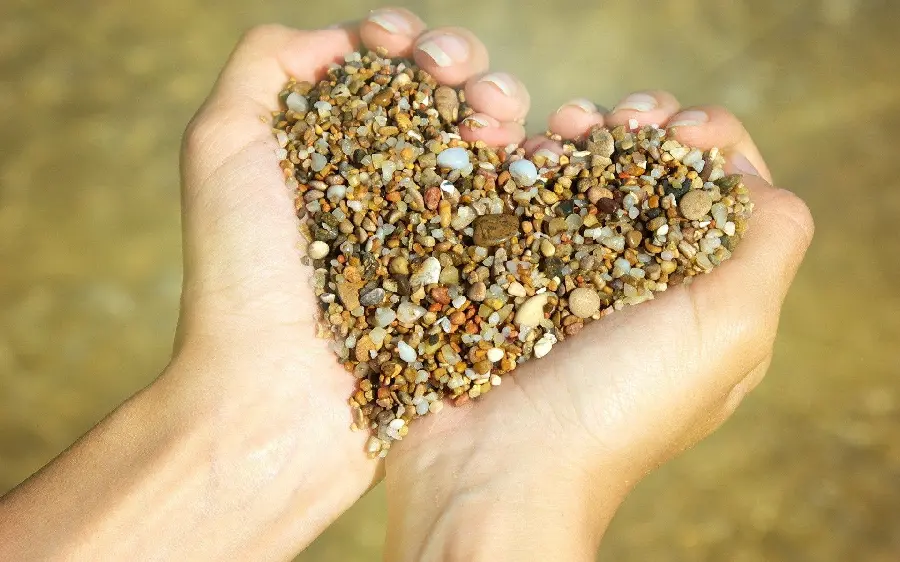 Download Very High Quality Photo of Making Heart with Sand in Hand for WhatsApp Profile in 8k Quality