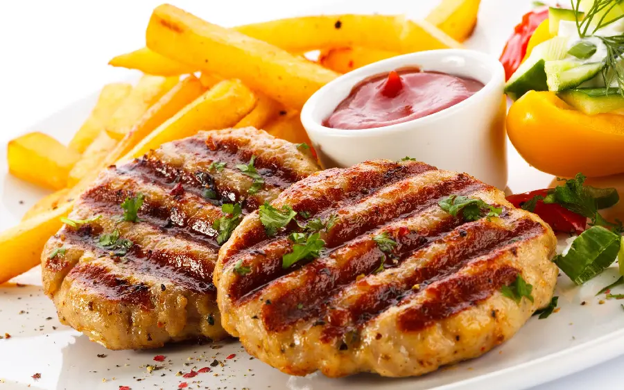 Photo of chicken steak and fries